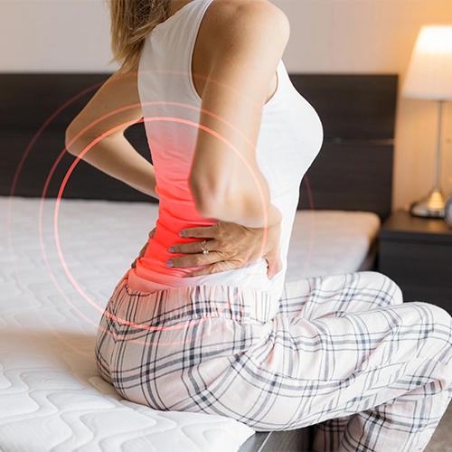Woman With Highlighted Back Pain